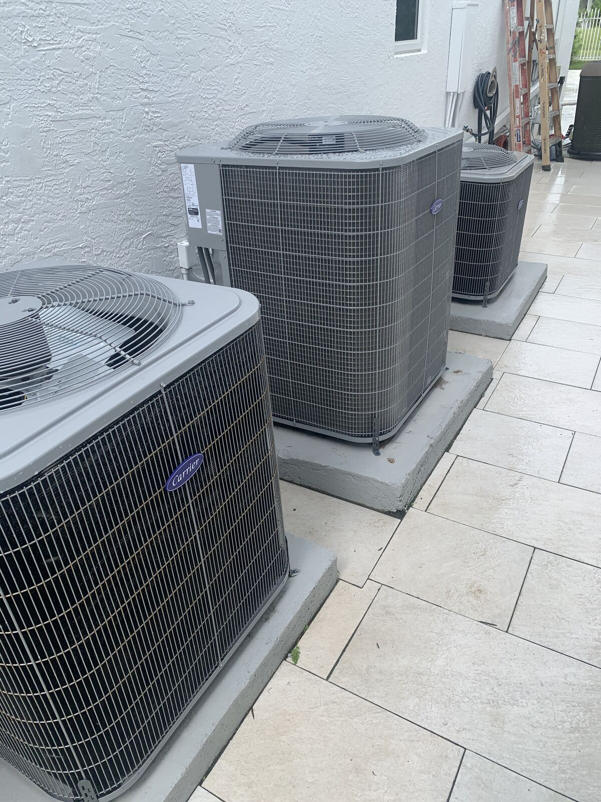 Row of newly installed air conditioning units